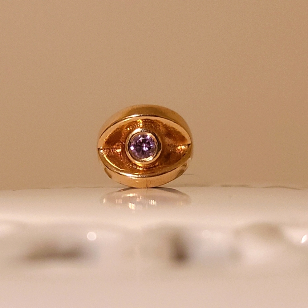 Pandora 14k solid gold charm with purple CZ